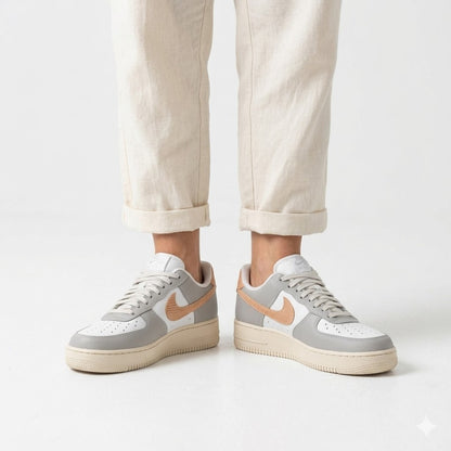 Zapatilla Nike Gris con Pipa Coral